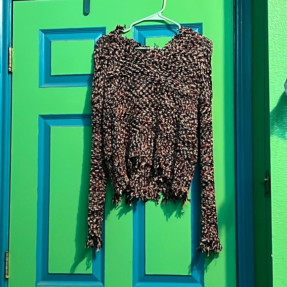 “Torn” sweater sized medium only wore a couple of times no holes. - Picture 1 of 4